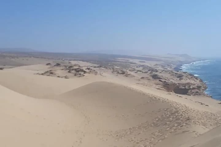 Sunset sandboarding with mint tea