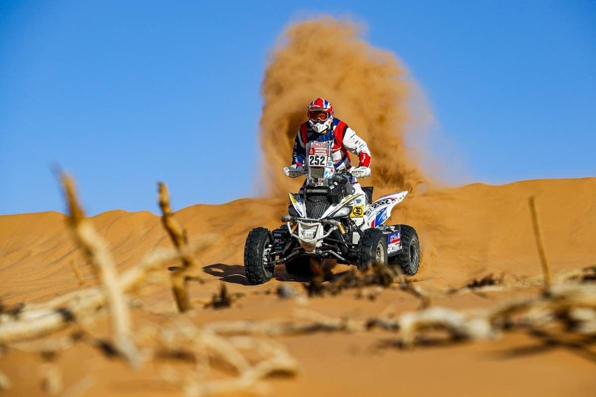 A quad bike riding a dusty trail through the countryside near Agadir